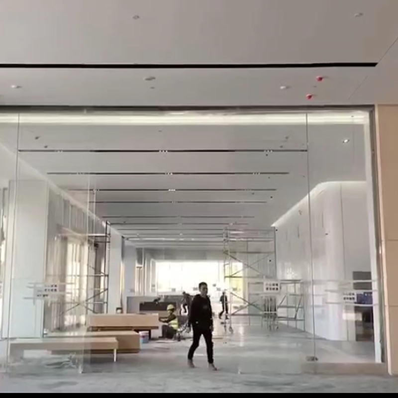 Puerta de entrada sin marco de alta calidad, puerta corredera automática para edificios comerciales.