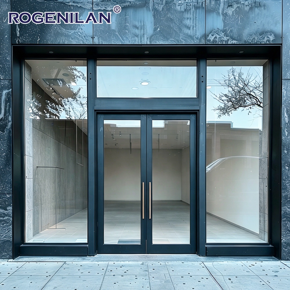 Puerta de entrada comercial de seguridad de aluminio a medida Rogenilan, con vidrio templado exterior y doble hoja batiente.